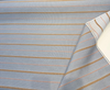 Sunbrella Linger Slate performance fabric with slender coral pinstripes between caramel checked bands