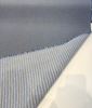 Sunbrella Lure Denim performance fabric showing the scattered organic dot pattern on heathered blue