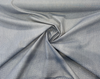 Sunbrella Lure Denim Fusion collection dot pattern in denim blue, light gray and white