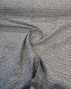 Close view of the Revolution Tara Jewel basketweave with black, charcoal and ivory yarns