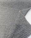 Revolution Tara Jewel fabric on the roll showing the salt and pepper woven texture