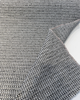 Revolution Tara Jewel fabric on the roll showing the salt and pepper woven texture