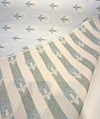 Sunbrella Mira Spring floral pattern showing stylized blooms with teal-green stems on light blue