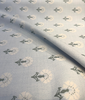 Sunbrella Mira Spring reverse detail showing sage and cream stripe created by the jacquard structure