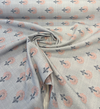 Sunbrella Mira Sapphire fabric draped to show the soft hand and all-over floral layout