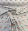 Sunbrella Mira Sapphire fabric draped to show the soft hand and all-over floral layout