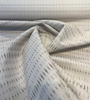 Sunbrella Esti Birch 44349-0001 neutral stripe fabric on the roll