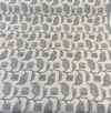 Close view of Sunbrella Lola Juniper weave with etched crosshatch linework inside each green leaf motif