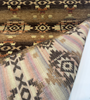 Southwestern geometric chenille fabric with stepped diamonds in espresso and rust