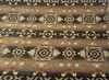 Desert southwestern tribal chenille upholstery fabric in rust brown and caramel