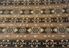 Rust cream and sage southwestern tribal chenille upholstery fabric detail