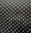 Heritage black diamond trellis fabric on the roll, 55 inches wide