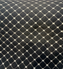 Heritage black diamond trellis fabric on the roll, 55 inches wide