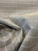 Sunbrella Ticking Dove taupe linen look stripe fabric on the roll
