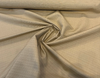 Sunbrella Dupione Raffia railroaded texture running across the roll