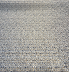 Kravet 34697-521 navy steel blue gold woven pixel pattern close-up