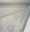 Kravet Design pixel mosaic fabric showing acrylic backing detail