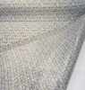 Kravet Design pixel mosaic fabric showing acrylic backing detail