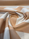Sunbrella Rue Peach tan cream stripe fabric on the roll