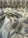 Sunbrella Lola Slate blue gray linocut botanical pattern on cream on the roll