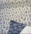 Lola Slate spiral diamond pod motifs in steel blue on warm ivory ground