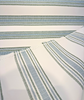 Sunbrella Ripple Stripe Aloe railroaded stripe fabric showing reverse detail