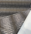 Ortiz Onyx 146474-0003 golden caramel dash marks on inky black woven stripe close-up