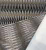 Ortiz Onyx 146474-0003 golden caramel dash marks on inky black woven stripe close-up