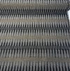 Sunbrella Ortiz Onyx black and gold etched stripe indoor outdoor upholstery fabric