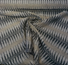 Sunbrella Ortiz Onyx dimensional etched gold marks on black ground close-up