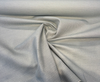 Sunbrella Suelo Mist warm neutral beige woven solid fabric drape detail