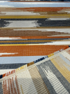 Sunbrella Transformation Canyon terracotta rust golden yellow charcoal stripe on the roll