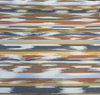 Transformation Canyon warm southwestern ikat pattern with gray-blue cream accents detail