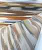 Transformation Canyon 146828-0004 feathered ikat stripe in terracotta rust gold and charcoal close-up