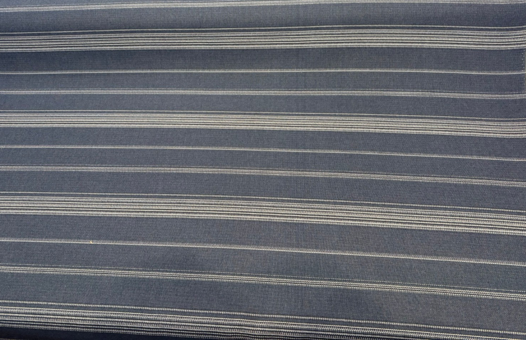 Sunbrella Toro Indigo navy blue and white multi-stripe indoor outdoor upholstery fabric