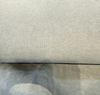 Fabricut Sensation Glacier soft blue-gray drape and hand detail