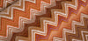 Opuzen Juno Canyon 9859-7900 rust orange zigzag velvet for accent chairs and sofas, 56 inches wide
