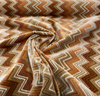 Opuzen Juno Canyon retro zigzag velvet upholstery fabric on the roll
