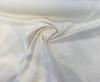 Crypton Lola Marshmallow off-white chenille, close-up of the nubby looped texture