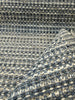 Revolution Tara Blue Mist chenille on the roll with the lighter striped reverse folded back