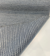 Revolution Tara Blue Mist denim blue chenille draped to show the horizontal striation
