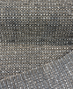 Revolution Tara Charcoal gray textured chenille on the roll with the lighter striped reverse folded back