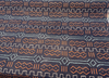 Revolution Prescott Navy close-up of the woven coral, aqua and pale gray motifs on navy