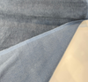 Fabricut denim blue mohair velvet with the lighter chambray backing folded back