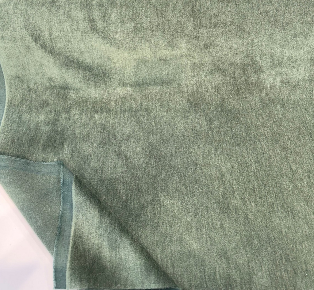 Fabricut mohair velvet in Jackpot Green sage with the darker teal-green backing folded back
