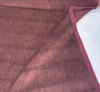 Close-up of Fabricut Raspberry mohair velvet showing the plum and dusty rose pile