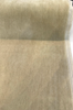 Fabricut Blond Beige mohair velvet laid flat on the cutting table