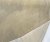Close-up of warm beige mohair velvet showing the champagne sheen of the pile