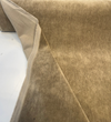 Brown Sugar mohair upholstery velvet unrolled on the cutting table