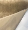 Brown Sugar mohair velvet draped in a swirl to show the golden sheen of the pile